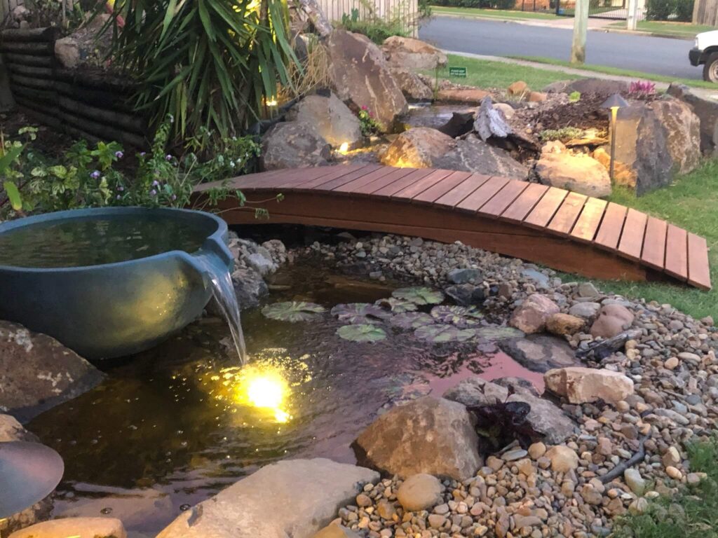 Pond, stream and custom bridge built by Pond Works in Kallangur, Queensland